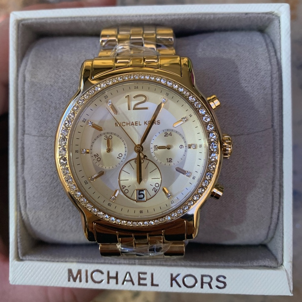 Michael Kors women’s Baisley watch  gold